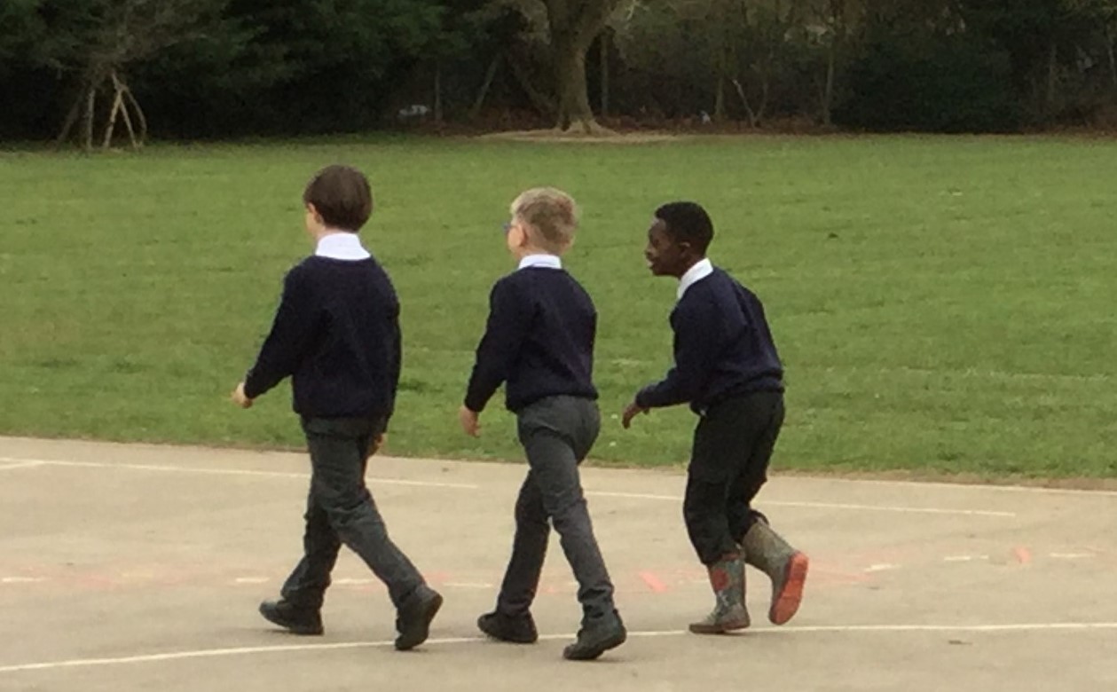 Children walking in the playground